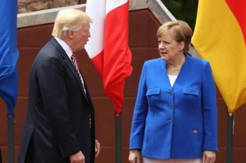 美国总统特朗普(右)和德国总理默克尔在此前g7峰会上会面
