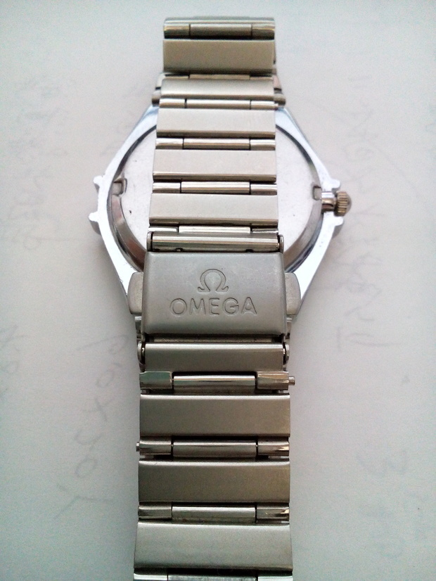 一块老表 求鉴定 欧米茄的 正面 omega quartz 反面 stainless steel