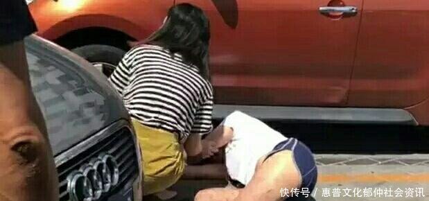 西安女子用人体肉身占车位被奥迪车碾压原地打