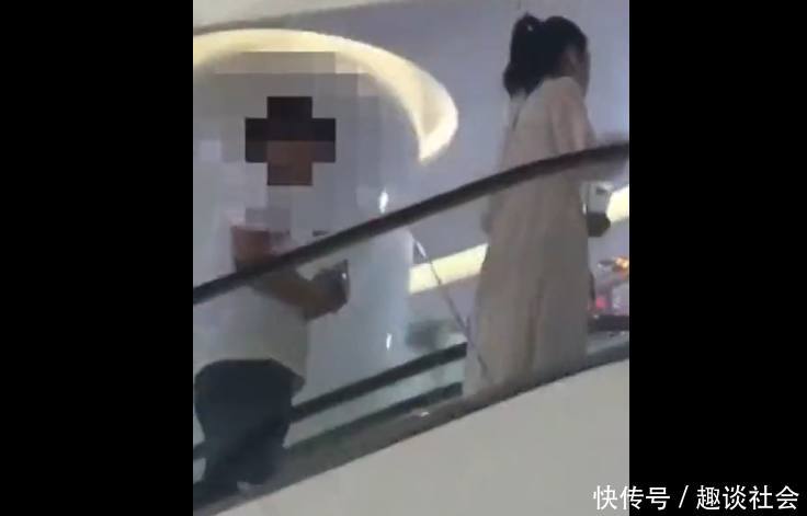 女子穿长裙乘扶梯,身后男子太无耻,网友:开闪光