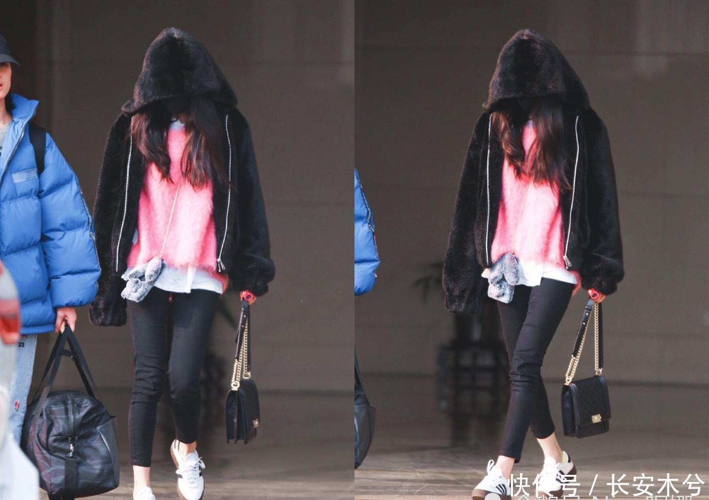 杨幂低调装扮现身机场,3万8的包包配5000皮草