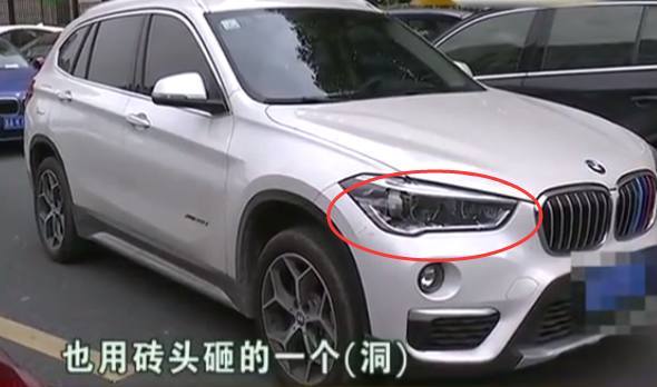 女子凌晨将宝马车停在消防通道,第二天早上发现车被砸了!