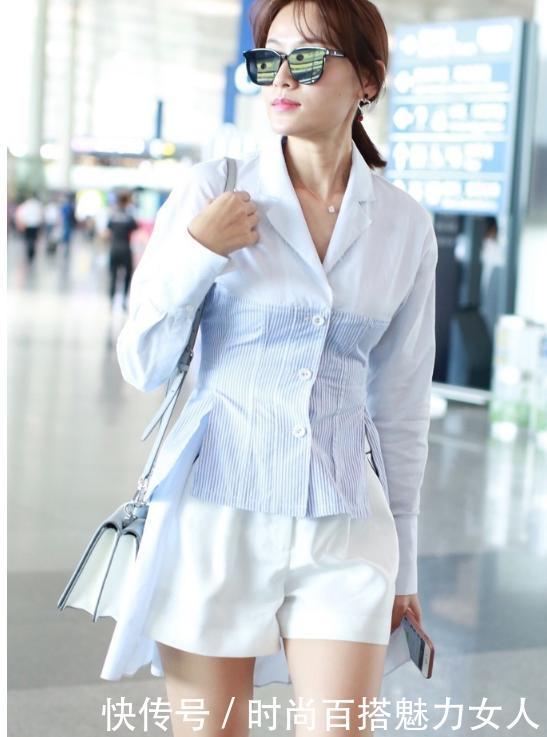 一茜身穿收腰小西服显优越身段,搭配白短裤清